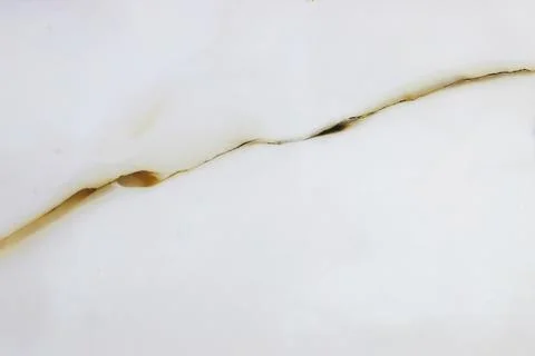 Close-Up of Marble Texture With a Long Natural Crack Across the Surface Stock Photos