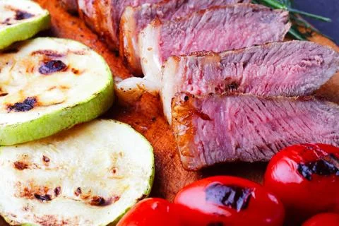 Close-up of marbled beef steak sliced on a cutting board Stock Photos