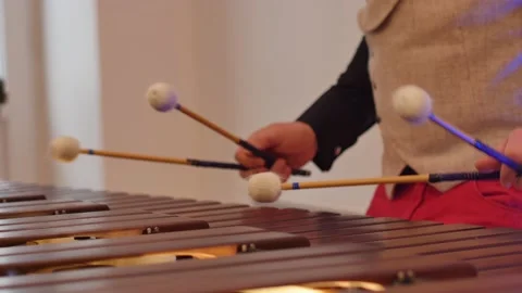 Close of a marimba played by the percussion section of band. male hands playing Stock Footage 145710815