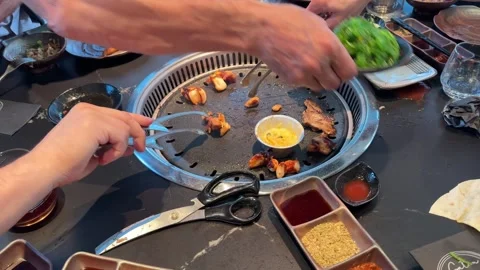 Close-up Marinated beef grilling on hot metal plate, sizzling oil bubbles, .. Stock Footage 335392281