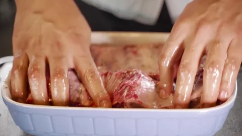 Close-Up of Marinated Beef Ribs Being Prepared and Grilled Stock Footage 328382329