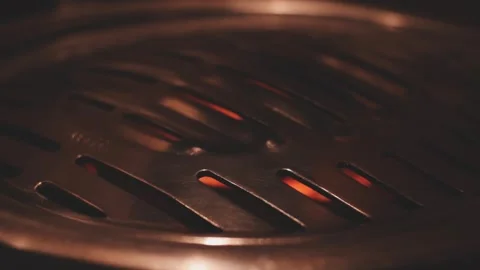 Close-up of marinated pork sizzling on a wire mesh gridiron over hot charcoal Stock Footage 344922012