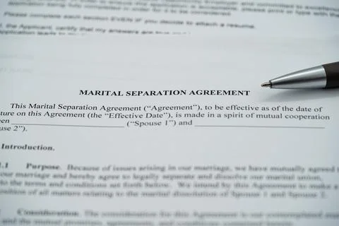 Close up of marital separation agreement document with pen on legal contract 写真素材