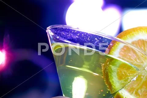 Close-up of a martini glass with orange Stock Photos