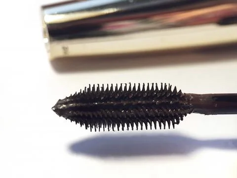 Close-up of mascara brush on white background.  Beauty concept. Stock Photos