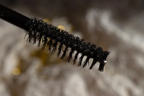 Close up of a mascara on grey background Stock Photos