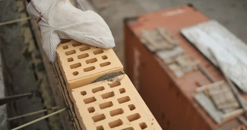 Close-up of masonry at construction site, mason works at a construction site Stock Footage 118295676
