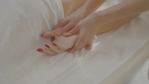 Close up masseuse does hands palm massage and pressing specific spots. Stock Footage 197660431