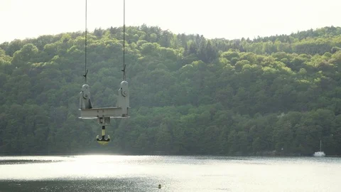 Close-up of massive metal crane. Hook, rails and pulleys 库存影片 93803230