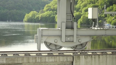 Close-up of massive metal crane. Hook, rails and pulleys Stock Footage 93843026