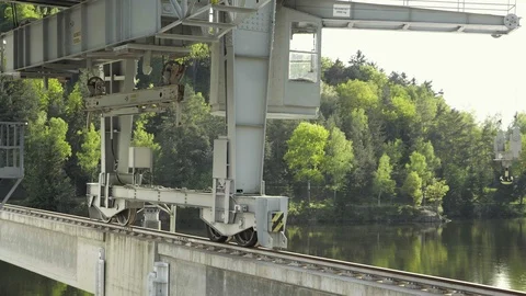 Close-up of massive metal crane. Hook, rails and pulleys Vidéo 95977346