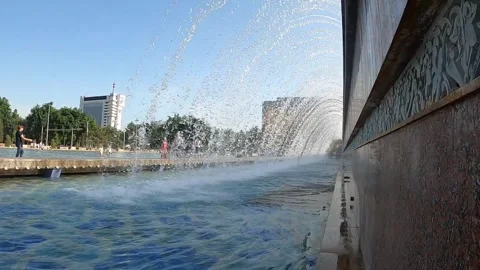 Close-up of a massive public cascade fountain wall in Tashkent, Uzbekistan Stock Footage 335351878