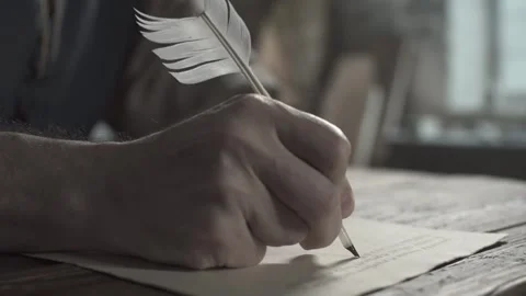 Close up of master hands writing cursive text with a quill pen Stock Footage 338992008