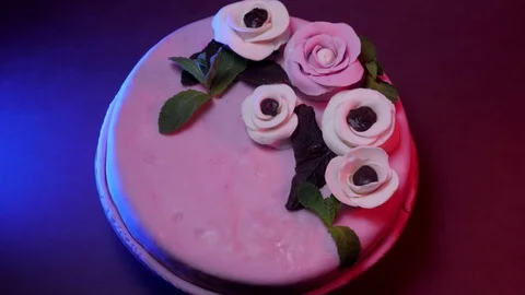 Close up of a mastic cake with roses rotation Stock Footage 130168015