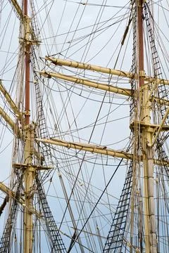 Close-up of the masts of a retro sailing ship. Photos