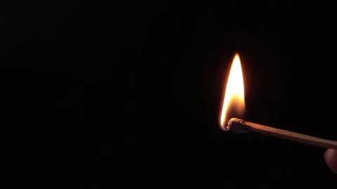 Close Up of Matchstick Lighting in Darkness Video stock 329615966