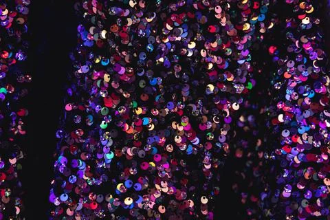 Close up on a material covered with small sequins Foto stock