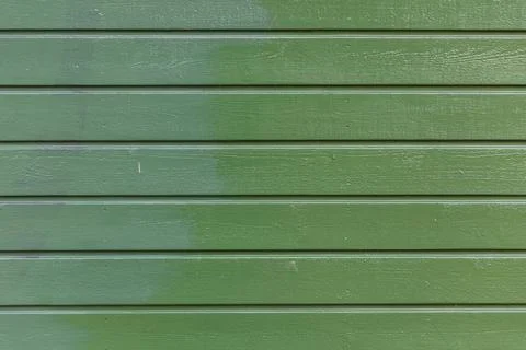Close-up material texture of green paint on wooden boards Stock Photos