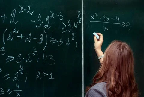 Close up of math formulas on a blackboard Stock Photos