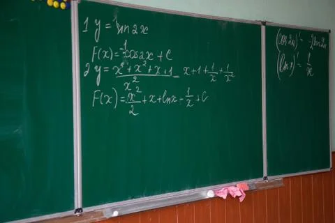 Close up of math formulas on a blackboard Stock Photos