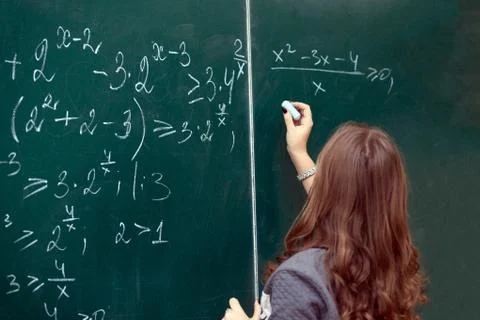 Close up of math formulas on a blackboard Stock Photos