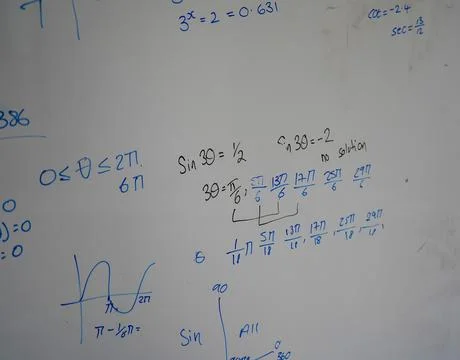 Close up of math, graphs and equations on a white board Stock Photos