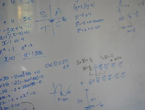 Close up of math, graphs and equations on a white board Stock Photos