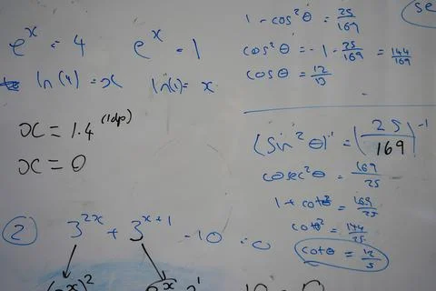 Close up of math, graphs and equations on a white board 库存照片