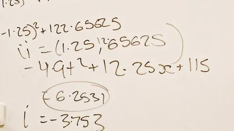 Close up of maths equations on a whiteboard Stock Photos