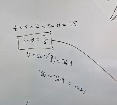 Close up of maths equations on a whiteboard Stock Photos