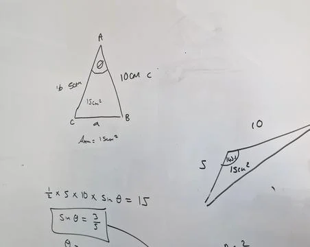 Close up of maths equations on a whiteboard Stock Photos