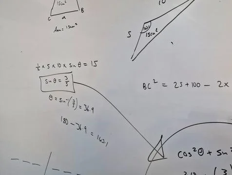 Close up of maths equations on a whiteboard Stock Photos