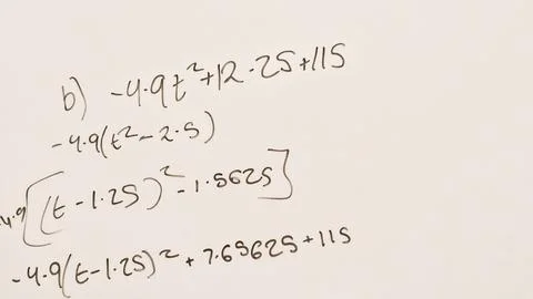 Close up of maths equations on a whiteboard Stock Photos