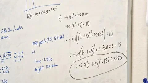Close up of maths equations on a whiteboard Stock Photos