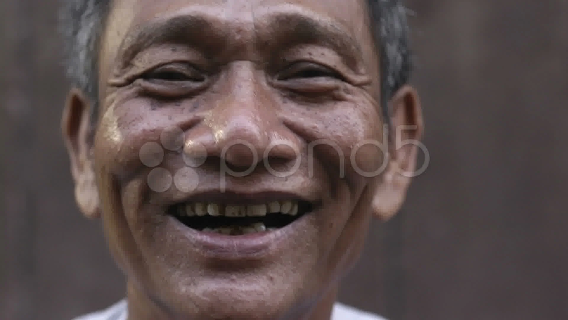 old asian man smiling