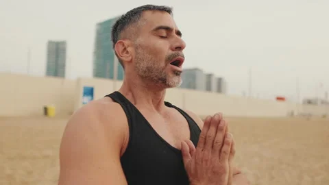 Close up, mature man doing breathing exercises Stock Footage 237318408