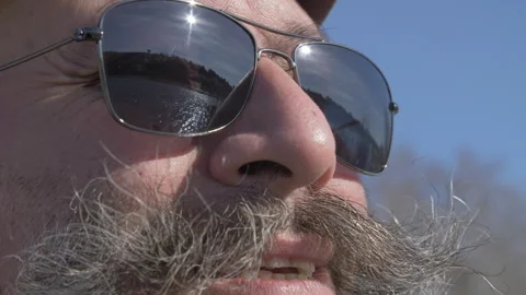 Close up of a Mature Man with Sunglasses looking the River 스톡 동영상 307065550