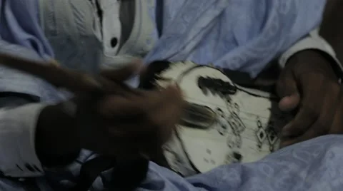 Close Up of Mauritanian Man playing Tidinit Stock Footage 47998053