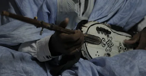 Close Up of Mauritanian Man playing Tidinit (4K) Stock Footage 48000902