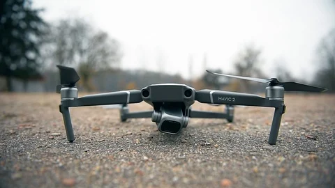 Close up with a Mavic 2 Pro drone initializing and taking off 스톡 동영상 102563950