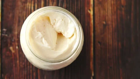 Close up of Mayonnaise in container on table . Stock Footage 159748273