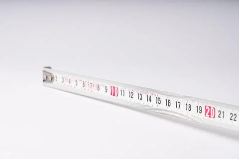 Close Up of Measuring Tape Scale on White Background Stock Photos
