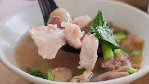Close up the meat base of Pork Offal Soup (Sabah Sheng Rou Mian) Stock Footage 300848142