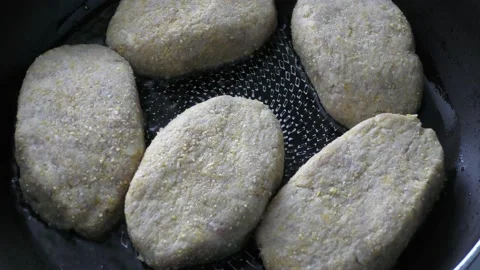 Close-up meat cutlets are fried in a frying pan Stock Footage 171988183