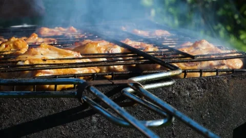 Close-up Meat is fried on the grill Stock Footage 200790017