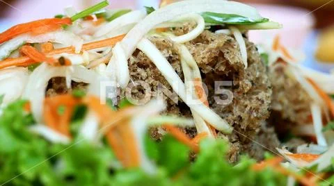 Close up of meat with vegetables on plate Stock Photos