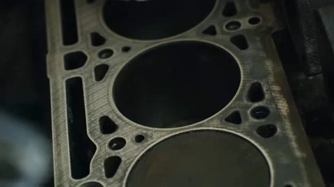 Close-up mechanic hands grinding a car engine cylinder head, removing dirt with Stock Footage 310521722
