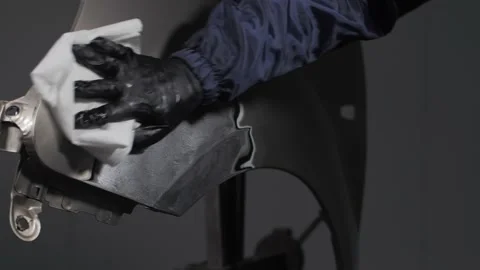 Close-up of a mechanic preparing a car body for painting Stock-Footage 202158757