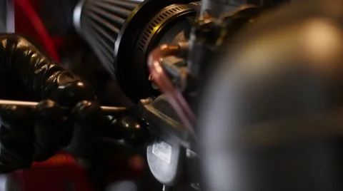 Close up mechanic using screwdriver on bike Stock Footage 65062412