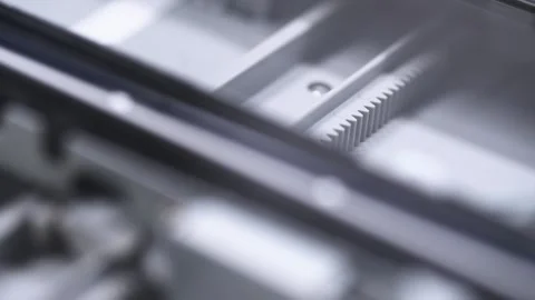 Close up of mechanical components inside flatbed scanner with metallic tone.. Stock Footage 334570826
